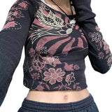 Black Gothic T-Shirt with red flower print and long sleeves.