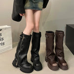 Ladies biker boots with belt buckle for a grung look