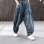 Indie-style oversized jeans with wide legs and Asian flair