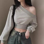 Asymmetric crop sweatshirt with one-sided neckline