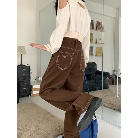 High-waisted brown jeans with heart design for alternative fashion