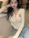 Springy V-neck crop top with cherry embroidery