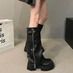 Ladies biker boots with belt buckle for a grung look