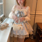 Magical Lolita Dress with Puff Sleeves and Bow Details