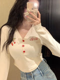 Springy V-neck crop top with cherry embroidery