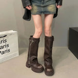 Ladies biker boots with belt buckle for a grung look