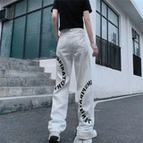 Y2K Streetwear Jeans mit inspirierendem Print in Schwarz und Weiß