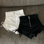 White shorts with zip and lace-up soft-girl style