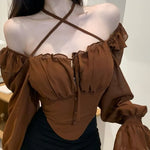 Fairy- grunge style blouse with puff sleeves and cross straps