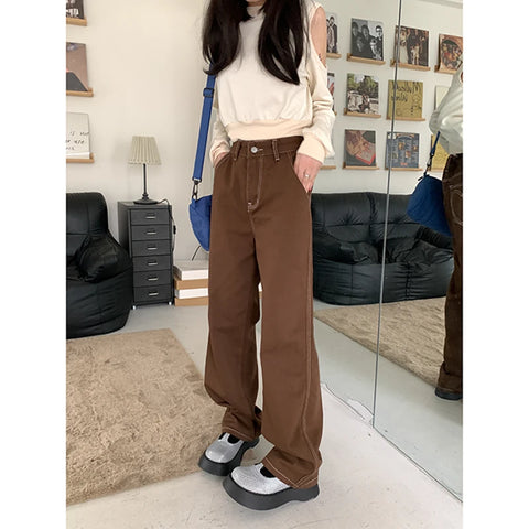 High-waisted brown jeans with heart design for alternative fashion