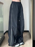 Schwarze Techwear-Cargohosen mit weitem Bei