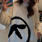 Y2K style sweater with Aphex Twin design