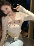 Springy V-neck crop top with cherry embroidery