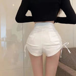 White shorts with zip and lace-up soft-girl style