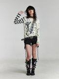 Gothic Patchwork Sweater with Star Design