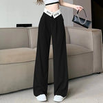 Women's wide-leg pants in E-girl style with high waist and draping