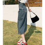 High waist denim skirt with fringes and slit and the Y2K style