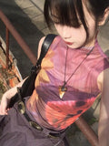 Trendy sleeveless mesh top in patchwork style with a see-through look