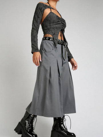 Gothic two-piece with ripped halter top and V-neck shawl