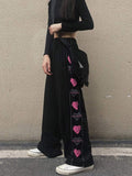 e-girl Oversize-Hose schwarz mit rosa Herzen